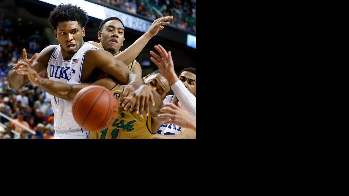 
Duke's Justise Winslow and Notre Dame's Demetrius Jackson go after the loose ball in the ACC tournament.

