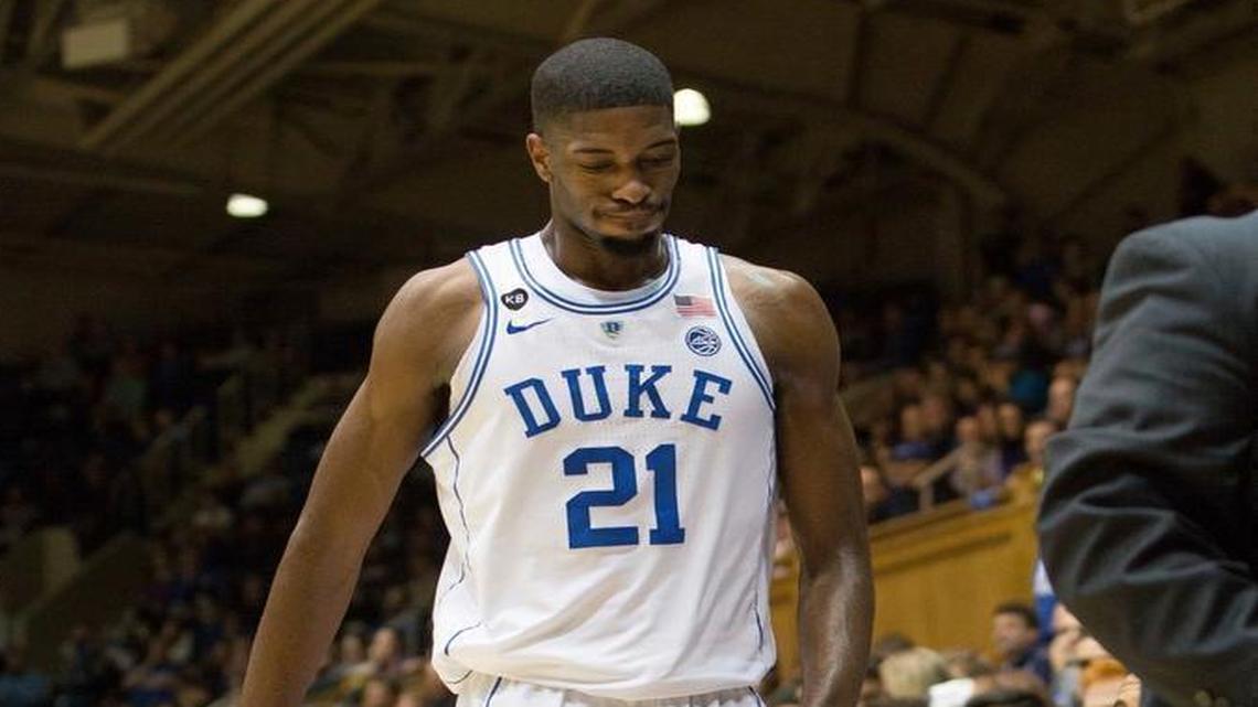 Duke's Amile Jefferson (21) leaves the bench after injuring his foot during the first half of an NCAA college basketball game against Boston College in Durham, N.C., Saturday, Jan. 7, 2017. Duke defeated Boston College 93-82.