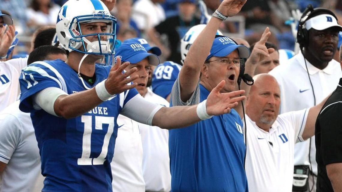 Duke head coach David Cutcliffe and quarterback Daniel Jones (17) react after an extra point by the Blue Devils barely makes the crossbar. The extra point ended up being good. Duke lost to Wake Forest 24-14 at Wallace Wade Stadium in Durham on Sept. 10, 2016.