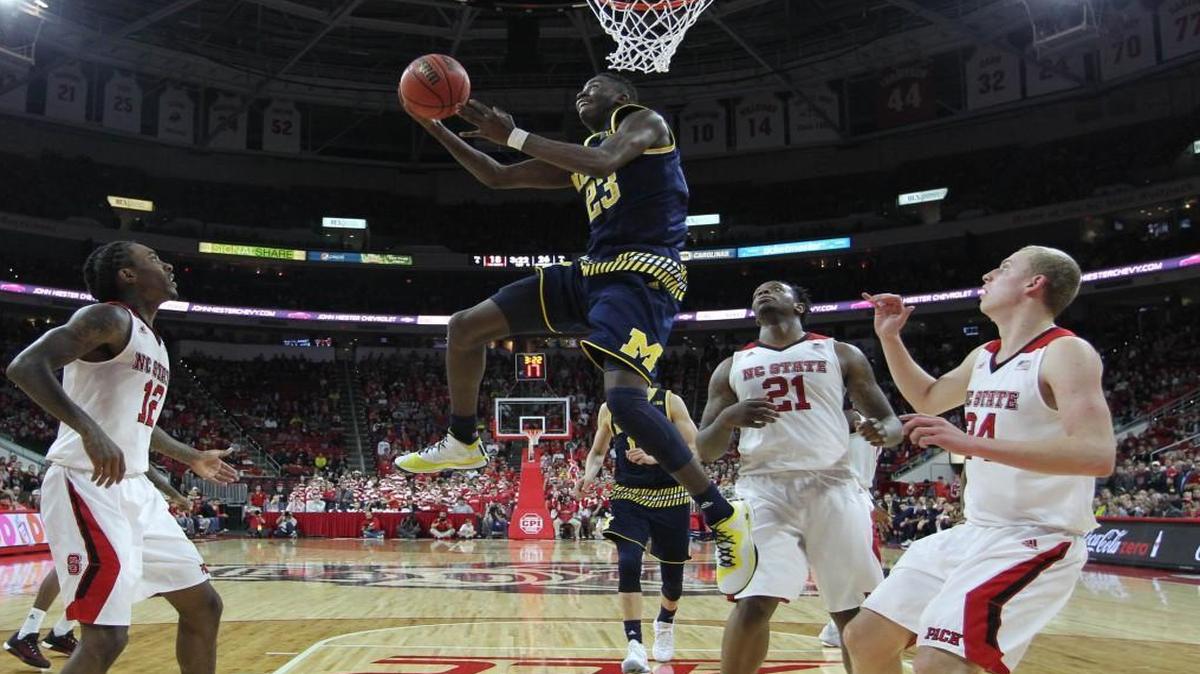 Michigan's Caris LeVert (23) makes a basket during Michigan's 66-59 victory over N.C. State at PNC Arena in the 2015 ACC/Big Ten Challenge.