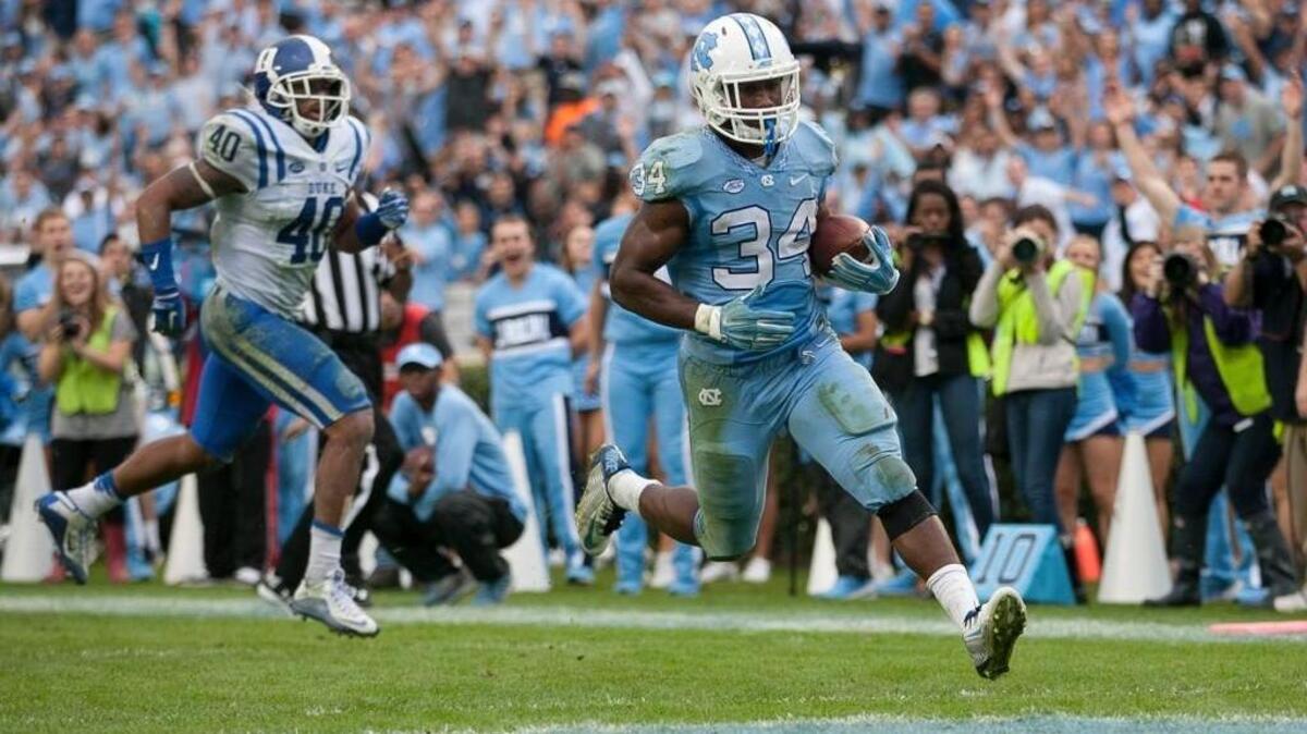 North Carolina tailback Elijah Hood, right, was named first-team all-ACC on Monday.