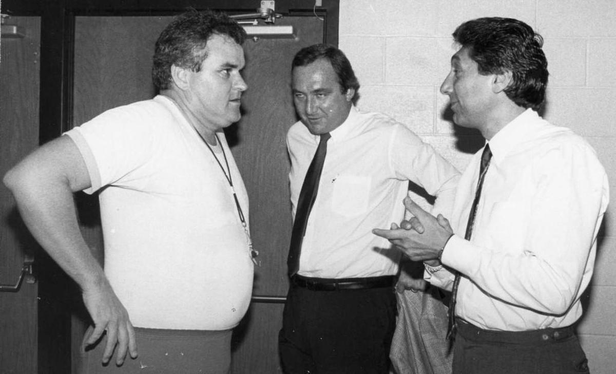 Chowan College Coach Bob Burke, left, and N.C. State Coach Jim Valvano in 1983.