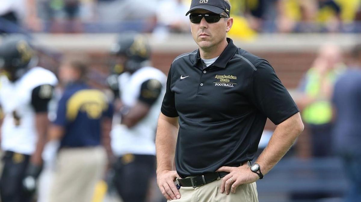 The Appalachian State Mountaineers head football coach Scott Satterfield watches the action during the second half of the game against the Michigan Wolverines on August 30, 2014 in Ann Arbor, Michigan. The Wolverines defeated the Mountaineers 52-14.