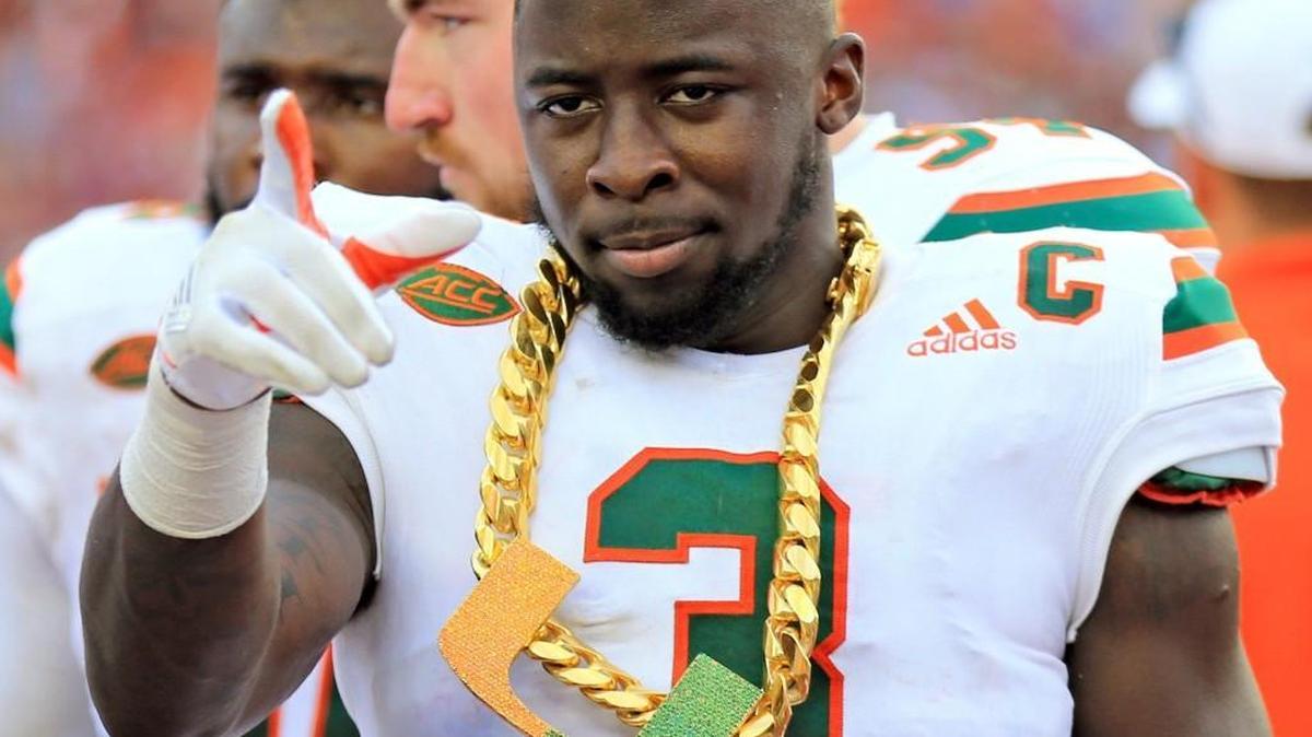 Miami defensive back Dee Delaney wears the Hurricanes’ turnover chain after intercepting a pass against Florida State on Oct. 7.