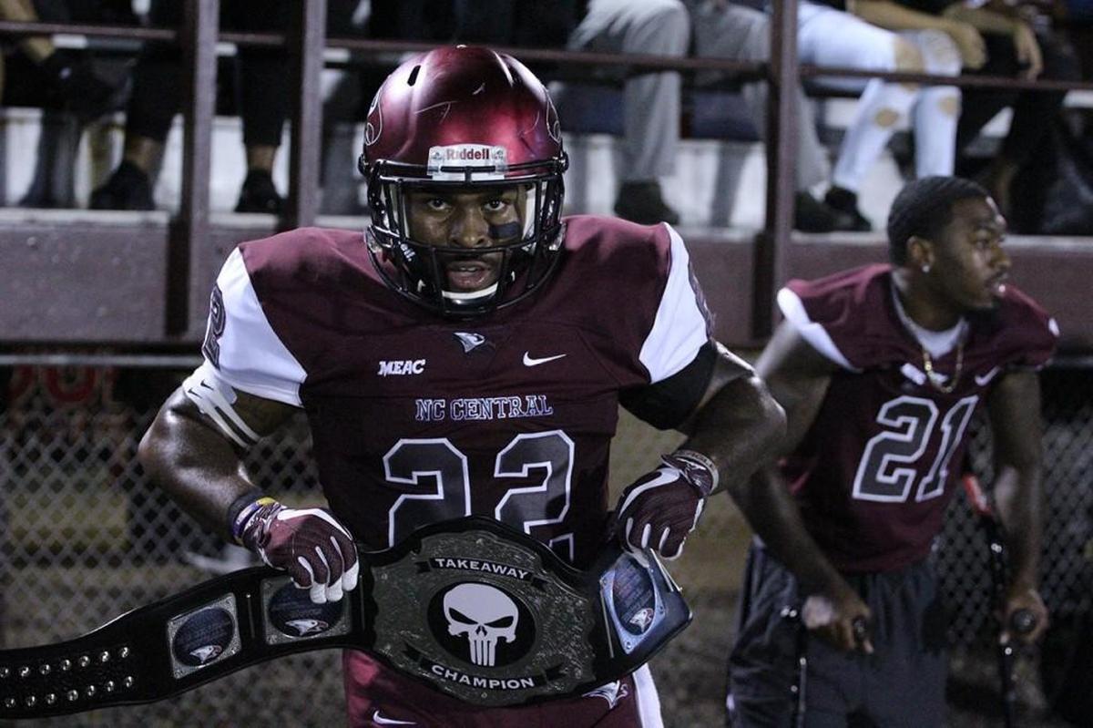 N.C. Central junior safety Davanta Reynolds shows off the take away belt after returning a fumble 85-yards for a touchdown against South Carolina State.