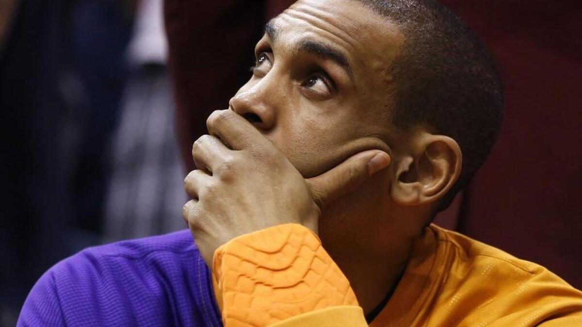 Phoenix Suns forward Grant Hill watches from the bench during the second half of an NBA basketball game against the Utah Jazz Tuesday, April 24, 2012, in Salt Lake City. The Utah Jazz won 100-88. (AP Photo/Jim Urquhart)