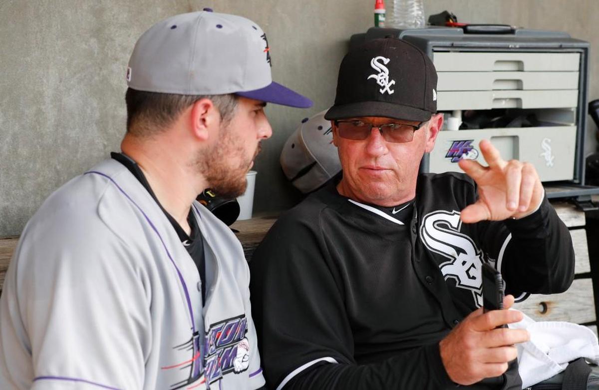 Former N.C. State pitcher Carlos Rodon talks with Chicago White Sox pitching coordinator Richard Dotson after pitching for Winston-Salem Dash during their game with the Carolina Mudcats at Five County Stadium in Zebulon, N.C., Tuesday, June 6, 2017.