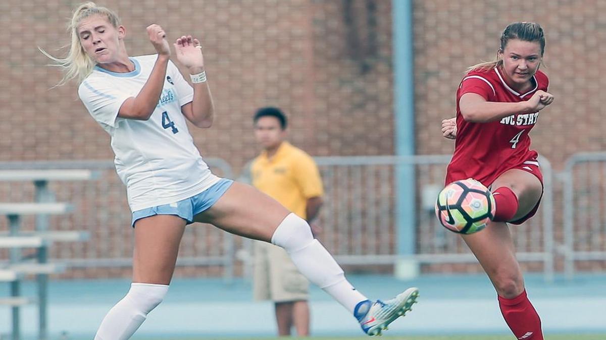 N.C. State's Hannah Keogh clears a ball past UNC's Bridgette Andrzejewski in the Pack's 1-0 win over No. 7 North Carolina.