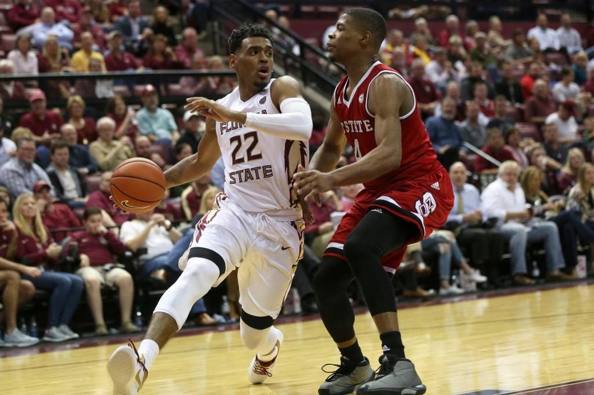 Florida State's Xavier Rathan-Mayes drives past North Carolina State's Dennis Smith Jr. on Feb. 8, 2017, in Tallahassee, Fla. (Joe Rondone/Tallahassee Democrat via AP)