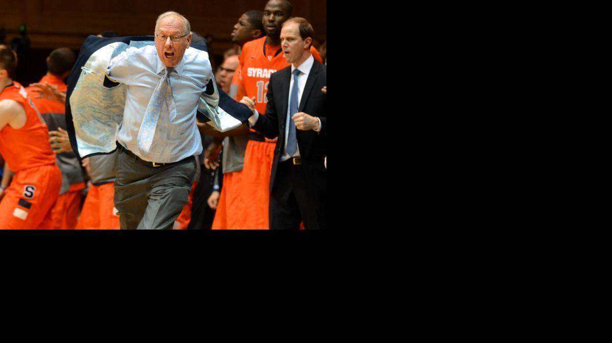 
Syracuse head coach Jim Boeheim charges the floor after a charge is called on Syracuse forward C.J. Fair in the closing seconds of the team’s Feb. 22 matchup again Duke. On Friday, the NCAA punished the Orange basketball program and  Boeheim for self-reported violations that dated to 2001. 
