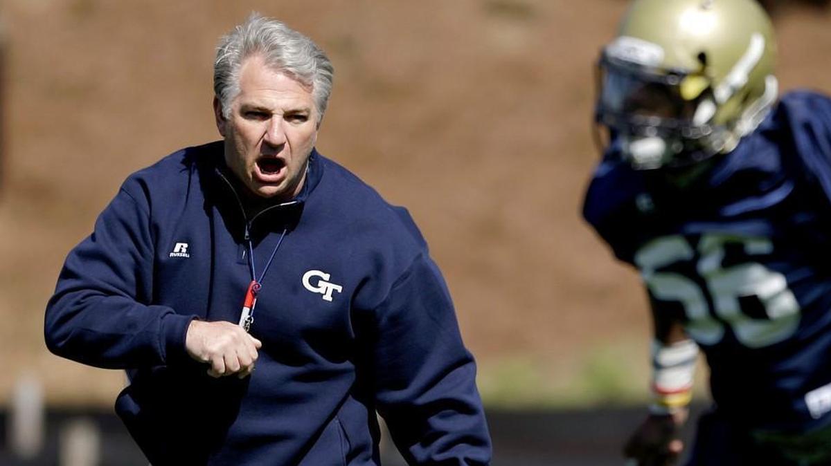 In this March 27, 2013 file photo, Georgia Tech defensive coordinator Ted Roof, left, directs his players during spring NCAA college football practice in Atlanta.
