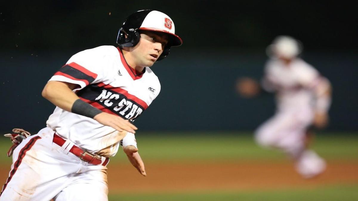 N.C. State's Stephen Pitarra (7), left, rounds third and heads to home on a double by Joe Dunand in the seventh inning of the Wolfpack's 6-4 victory over North Carolina on at Doak Field in Raleigh.