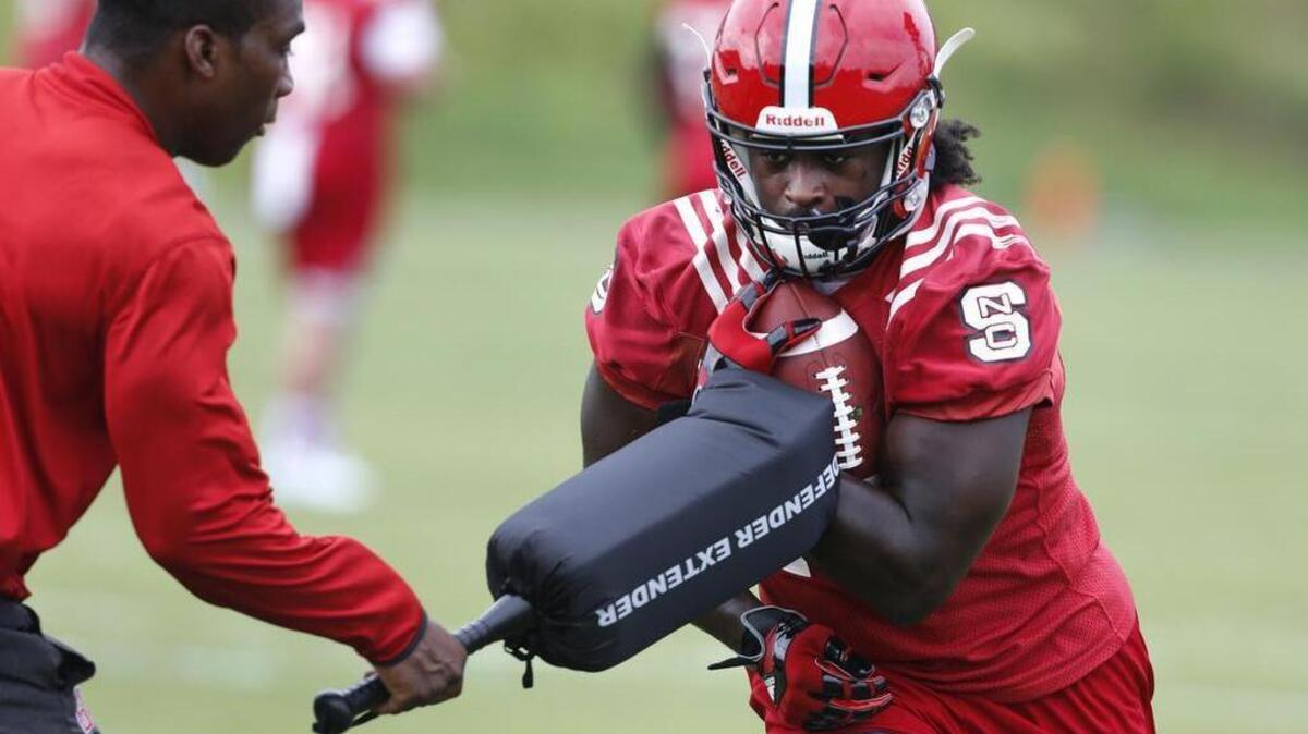 N.C. State running back Johnny Frasier (22) drills during the Wolfpack's first practice of fall camp at the Dail Practice Complex in Raleigh, N.C., Monday, August 1, 2016.