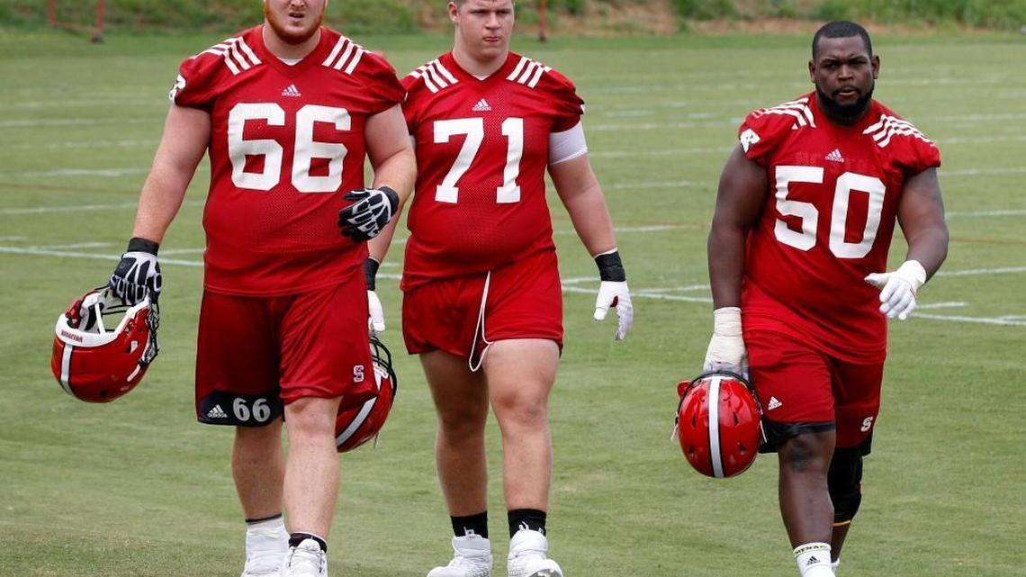 Joe Scelfo (66), Joe Sculthorpe (71) and Tony Adams will try to continue N.C. State’s strong offensive line production.