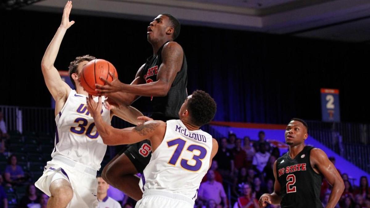 North Carolina State forward Lavar Batts, Jr. (3) drives to the basket as Northern Iowa's Spencer Haldeman (30) and Juwan McCloud (13).