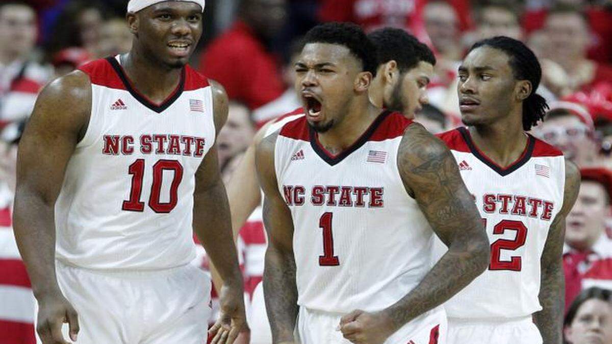 
N.C. State's Trevor Lacey (1) celebrates after Duke was called for an offensive foul during the second half of the Wolfpack’s 87-75 victory over Duke at PNC Arena in Raleigh on Sunday, Jan. 11, 2015. Lacey is leaving N.C. State for the NBA Draft.
