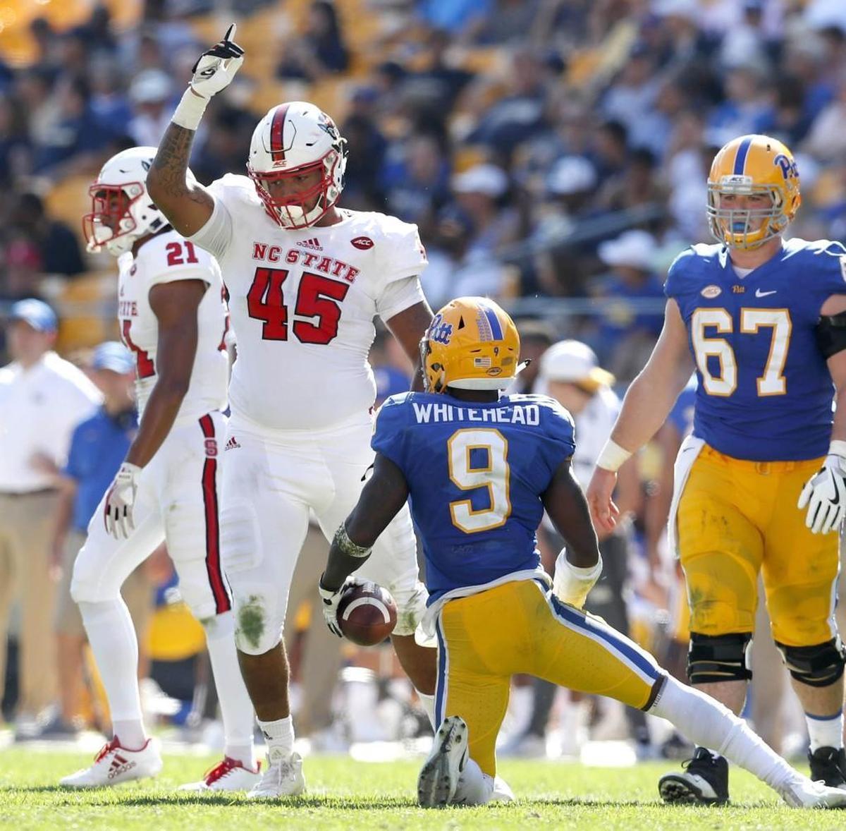 N.C. State's Darian Roseboro (45) celebrates after tackling Pitt's Jordan Whitehead (9) during the second half at Heinz Field in Pittsburgh, Pa. on Oct .14, 2017.