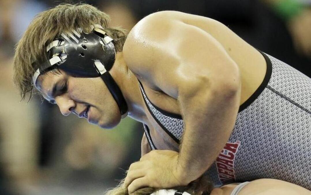 North Carolina State's Nick Gwiazdowski, top, controls Eastern Michigan's Gage Hutchison in a 285-pound match during the NCAA Division 1 wrestling championship in New York, Thursday, March 17, 2016.