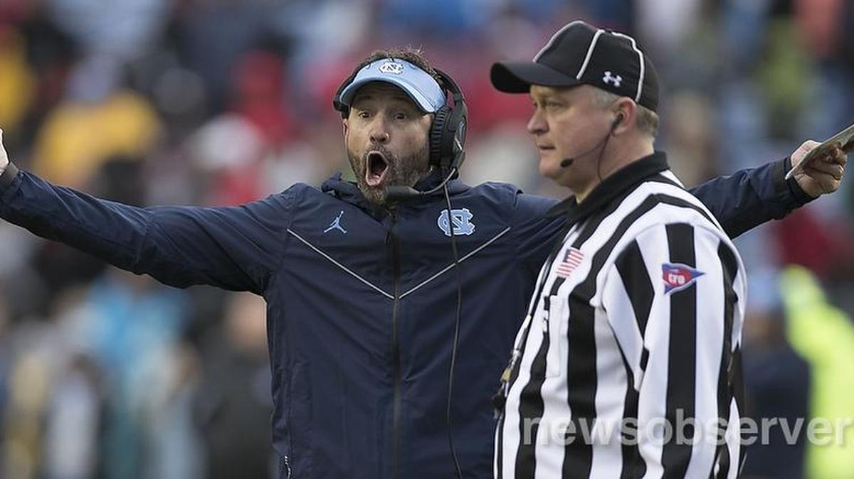 North Carolina coach Larry Fedora yells at officials during the N.C. State possession in overtime on Saturday, November 24, 2018 at Kenan Stadium in Chapel Hill, N.C.
