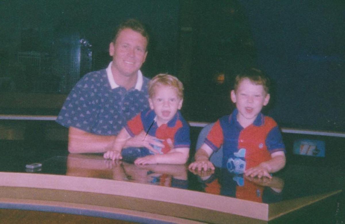 Brad Debo, middle, sits in the ABC11 studio with his dad Tony, left, and brother, Nick, right, in 1999. Brad Debo and his NC State baseball team play Indiana on Friday in the NCAA baseball tournament.