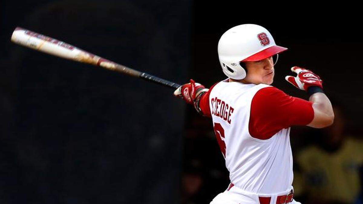 
N.C. State's Logan Ratledge (6) hits during N.C. State's game against Georgia Tech at Doak Field in Raleigh, N.C., Friday, April 25, 2014.
