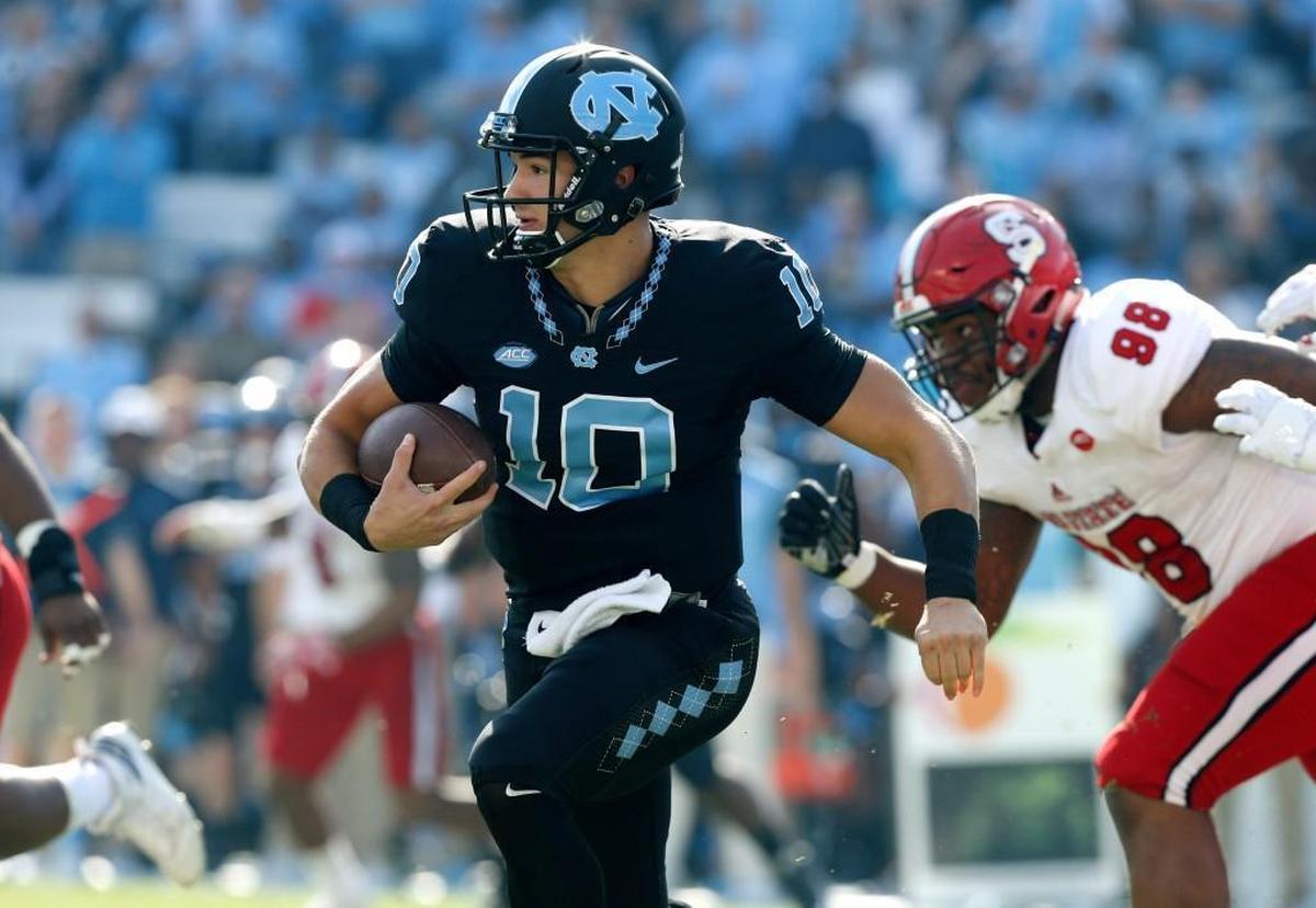 North Carolina quarterback Mitch Trubisky runs against N.C. at Kenan Stadium on Nov. 25, 2016.