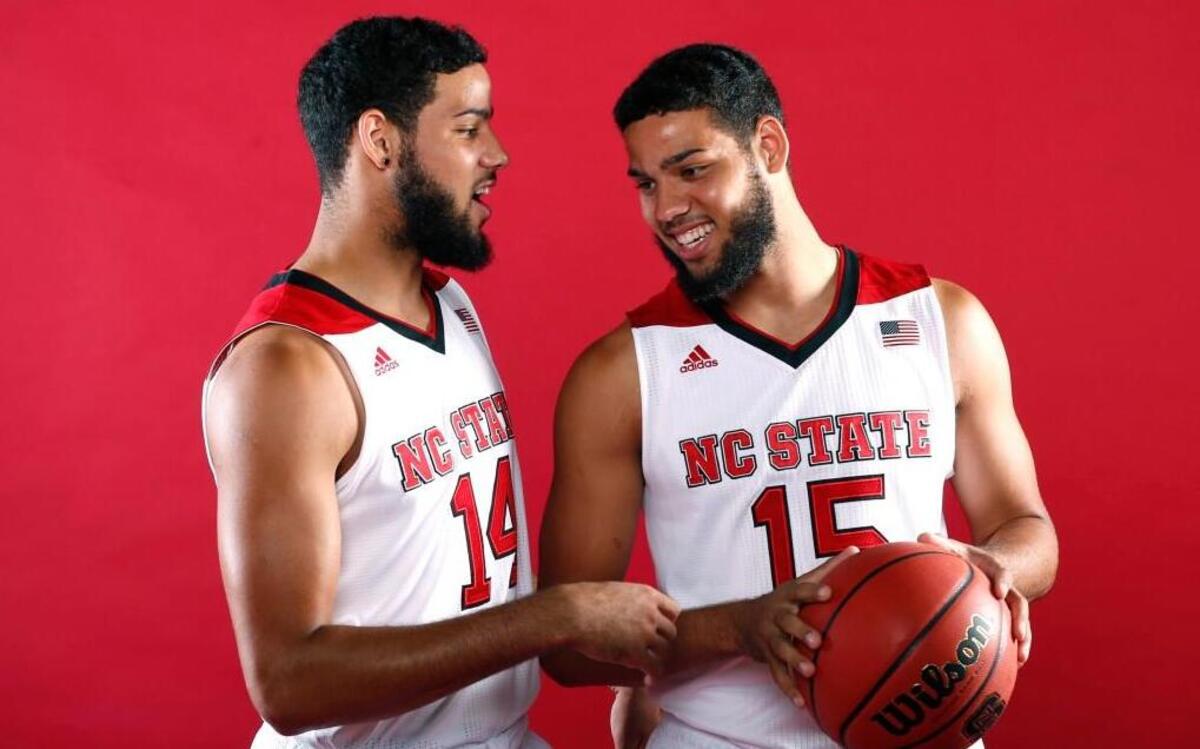 N.C. State’s Cody Martin (15), right, and Caleb Martin (14) clown around for a portrait during the N.C. State basketball media day at Dail Basketball Center in Raleigh Thursday, Oct. 1, 2015.