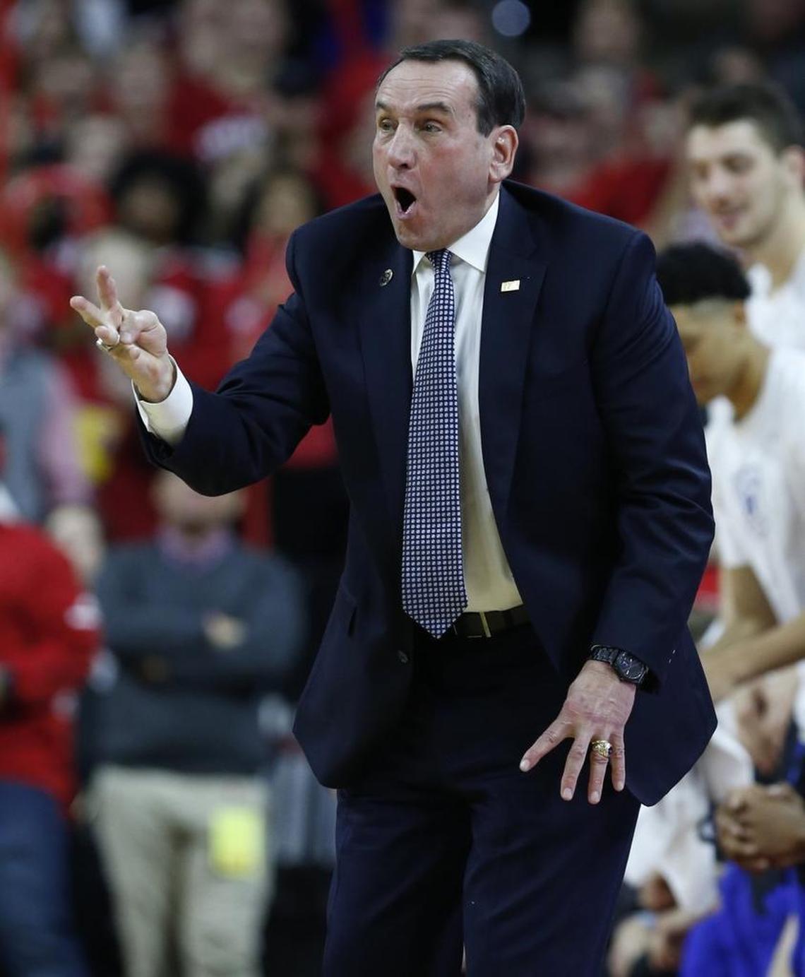 Duke head coach Mike Krzyzewski yells to his team during the first half of N.C. State's game against Duke at PNC Arena on Jan. 6, 2018.
