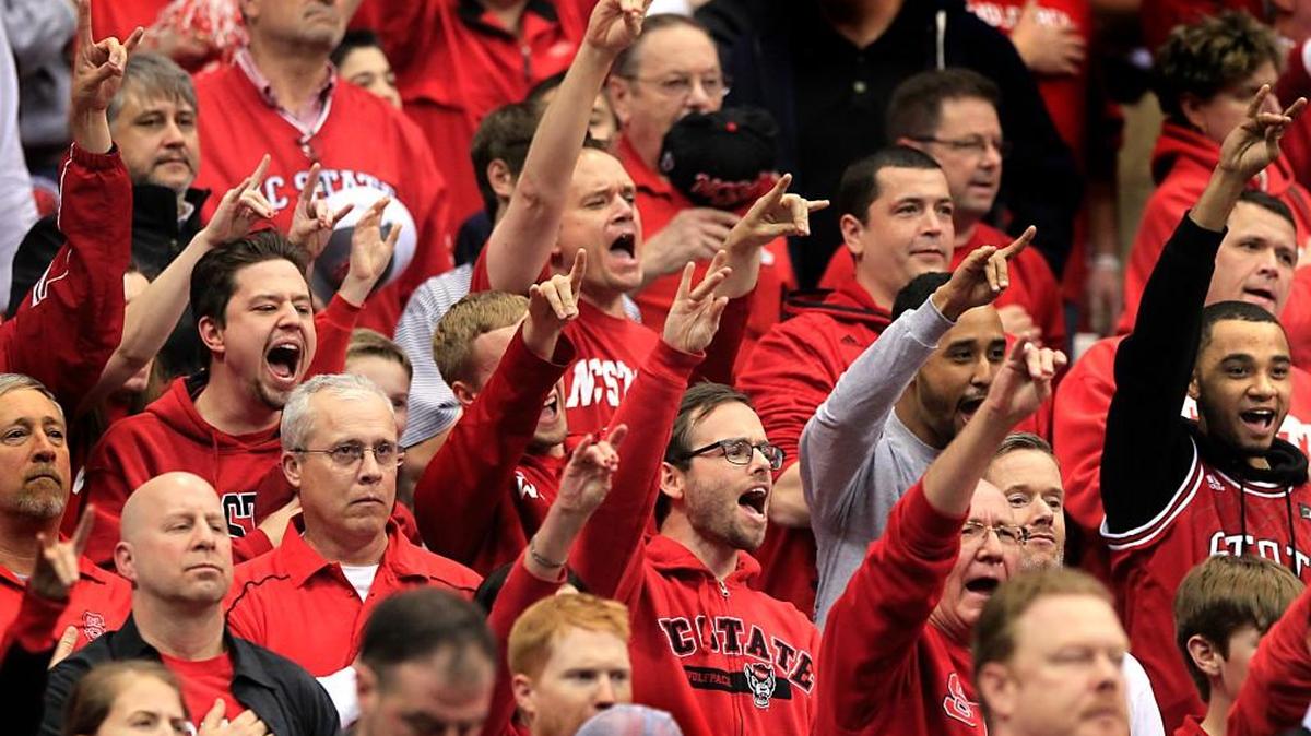 N.C. State fans cheer on their team in 2015. Four-star player Immanuel Bates will decide between the Wolfpack and Georgetown on Friday.