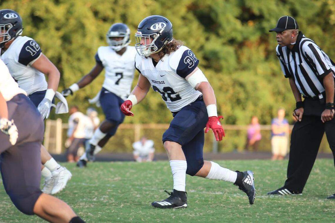 Heritage linebacker Drake Thomas (32) plays during a game against the Millbrook Wildcats on Friday, Aug. 31, 2018.