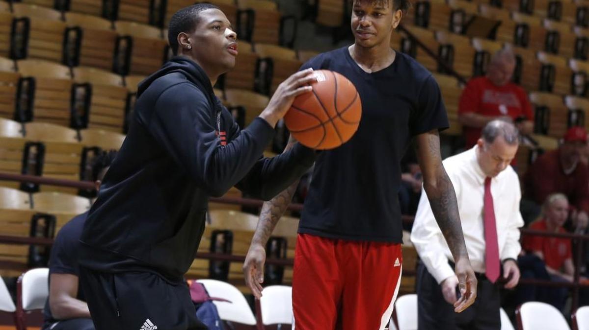 N.C. State’s Dennis Smith Jr., left, shoots as Shaun Kirk watches during warmups before the Wolfpack’s game against Virginia Tech on Jan. 2. Smith enrolled early at N.C. State to rehab a knee injury. He isn’t expected to play this season.