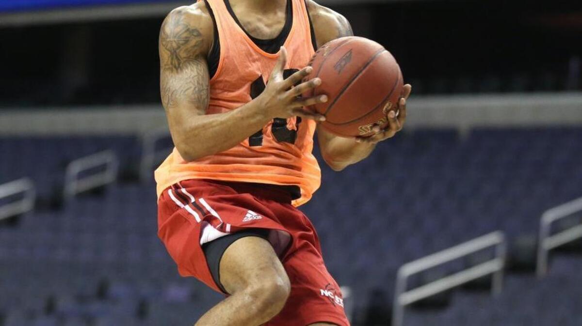N.C. State's Terry Henderson (3) heads to the basket during the Wolfpack's practice before the 2016 New York Life ACC Tournament at the Verizon Center in Washington, D.C., March 7.