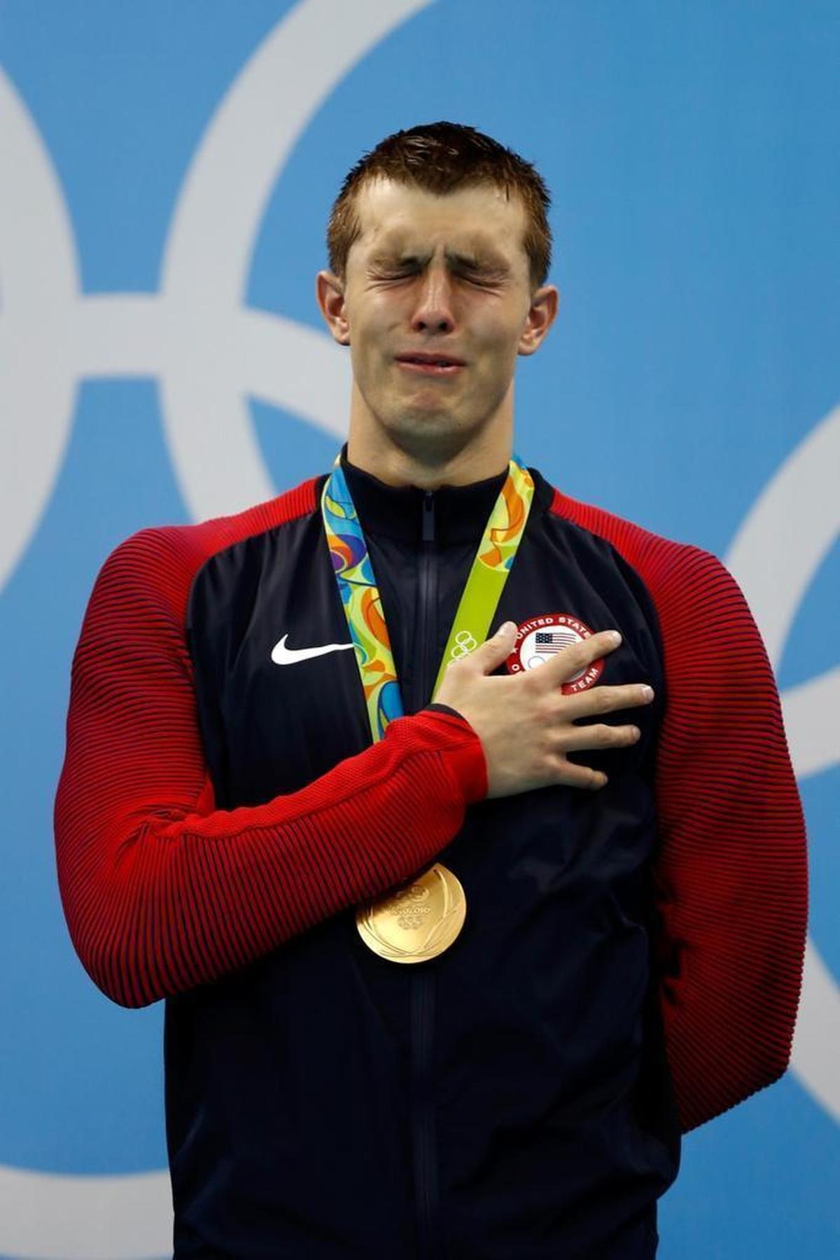 NC State swimmer Ryan Held shows his emotion on the podium after winning gold in the 4x100 meter freestyle relay on Aug. 7, 2016 at the Rio Olympics.
