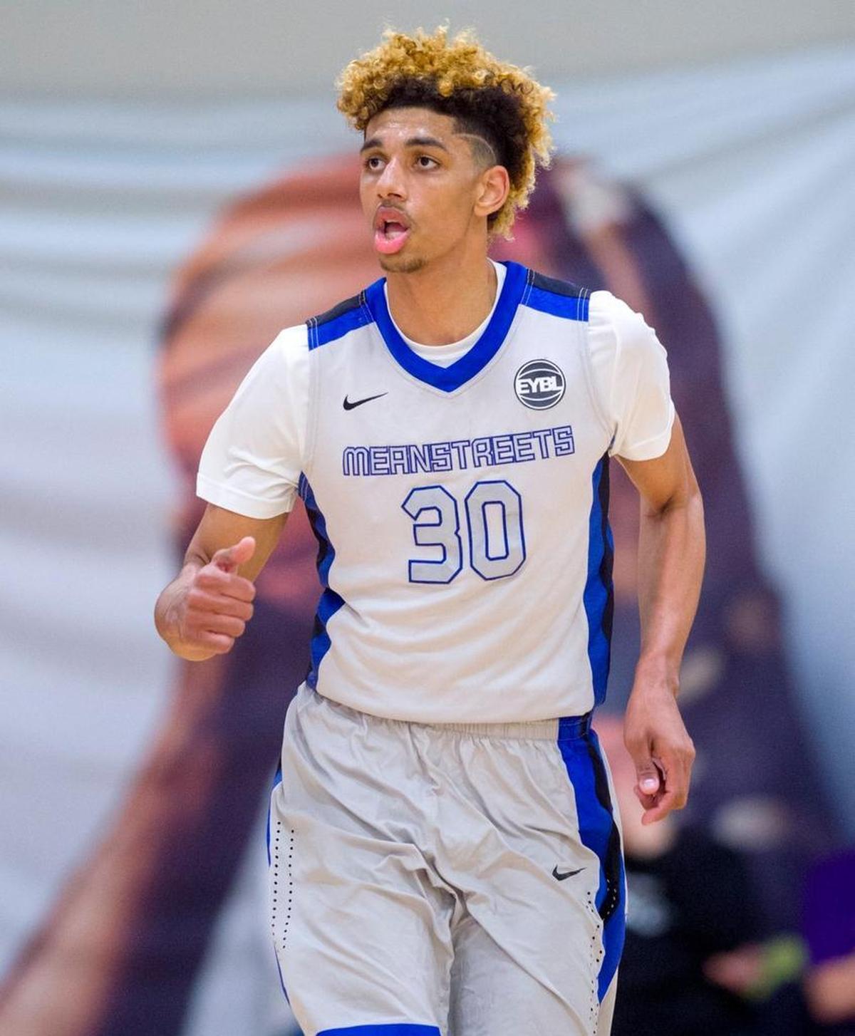 Brian Bowen (30) runs back up court during the Nike Elite Youth Basketball League recruiting basketball showcase at Grand Park's Jonathan Byrd Fieldhouse in Westfield on April 23, 2016.