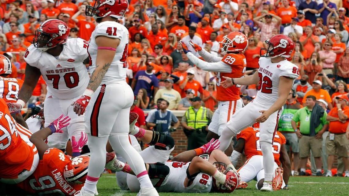 N.C. State's Kyle Bambard (92) watches his field goal attempt go wide right as time expires in regulation of Clemson's 24-17 overtime victory at Memorial Stadium.