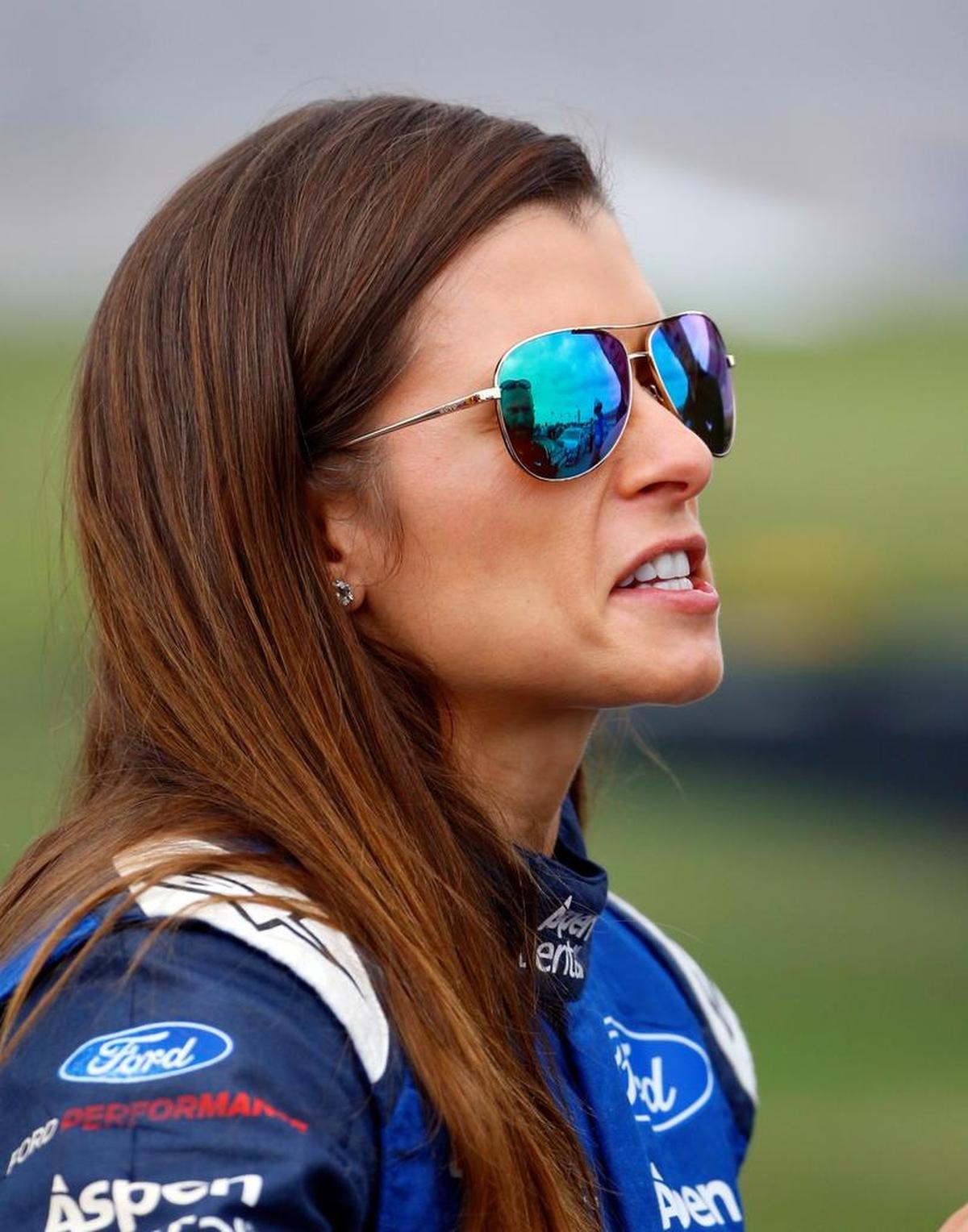Danica Patrick waits to qualify during qualifying for the NASCAR Cup Series auto race at Talladega Superspeedway on Oct. 14, 2017, in Talladega, Ala. (AP Photo/Butch Dill)