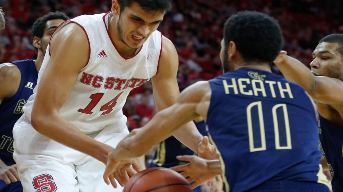 N.C. State's Omer Yurtseven (14) loses the rebound to Georgia Tech's Josh Heath (11) during the second half of Georgia Tech's 86-76 victory over N.C. State at PNC Arena in Raleigh, N.C, Sunday, Jan. 15, 2017.