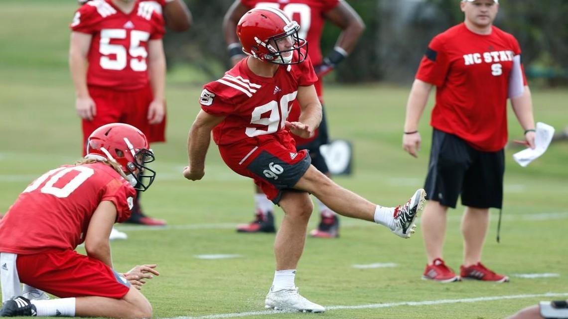 N.C. State’s Connor Haskins follows through on a kick during the Wolfpack’s first practice of fall camp on Aug. 1.