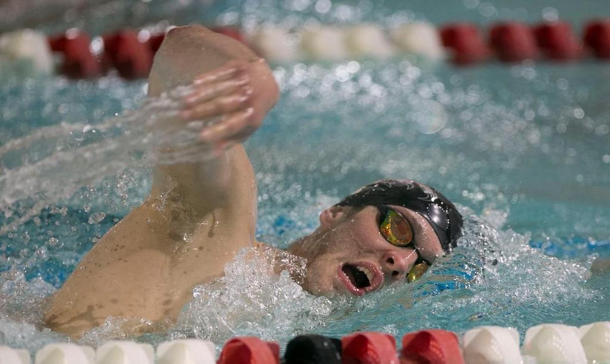 Olympic gold medalist Ryan Held works on his freestyle during NC State’s practice in February.