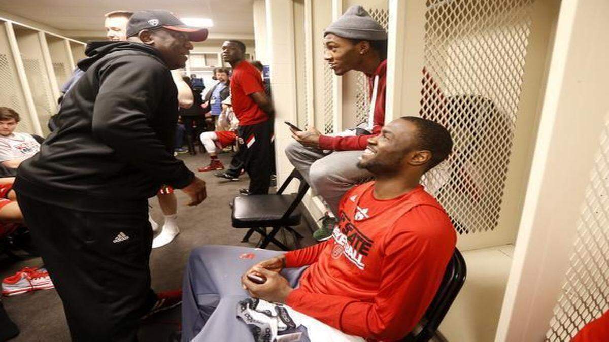 
N.C. State Director of Player Development Dereck Whittenburg jokes with Desmond Lee, right, and Cat Barber as the Wolfpack get ready to practice at the Consol Energy Center in Pittsburgh, Pa. Friday, March 20, 2015. The Wolfpack will face Villanova Saturday in the third round of the NCAA Division I Men's Basketball Tournament.
