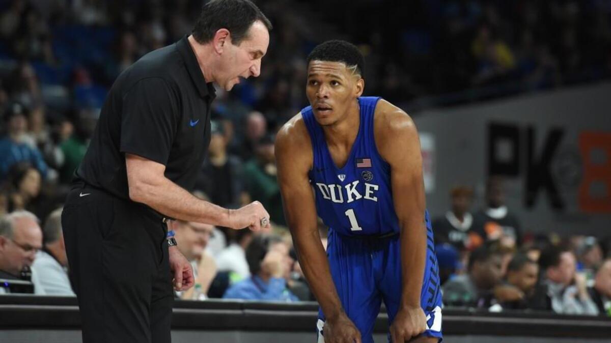 Duke coach Mike Krzyzewski, left, talks to Trevon Duval during the Blue Devils’ game against Portland State in the PK80 on Thursday. Duke won 99-81.