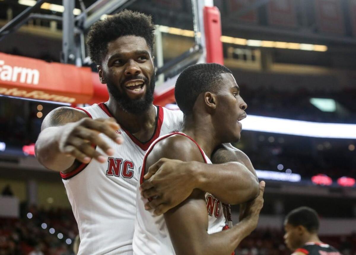 North Carolina State Wolfpack forward Lennard Freeman (1) congratulates North Carolina State Wolfpack guard Torin Dorn (2) after he completed a layup against VMI during the first half.