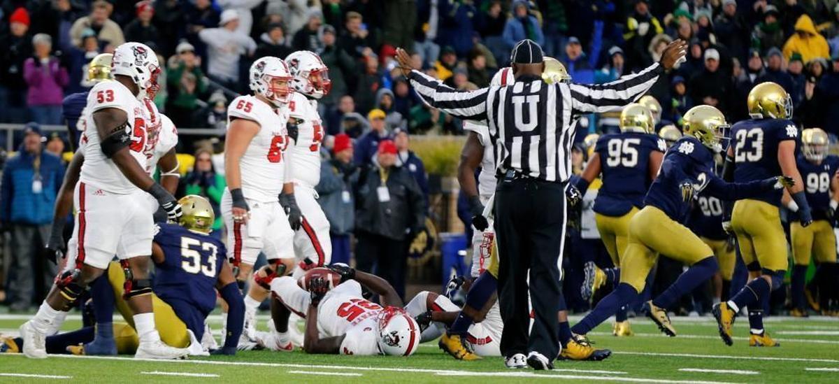 Notre Dame celebrates after stopping N.C. State running back Reggie Gallaspy II (25) on 4th and one during the Irish’s 35-14 victory in South Bend, Ind., Saturday, Oct. 28, 2017.