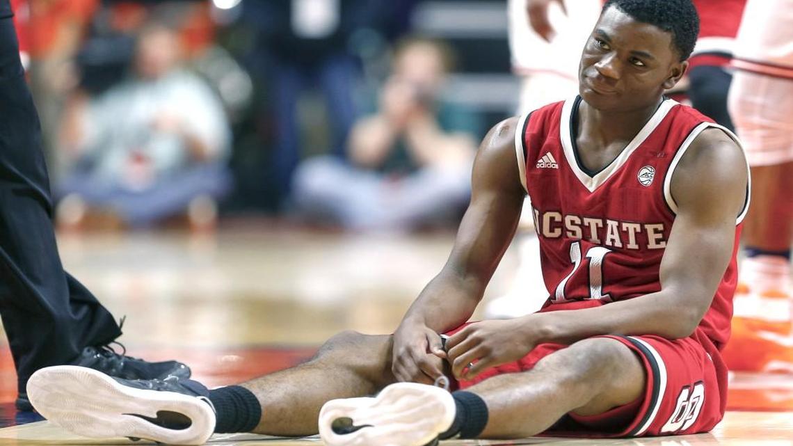 N.C. State’s Markell Johnson reacts after fouling out during their game against Illinois at State Farm Center on November 29, 2016 in Champaign, Illinois.