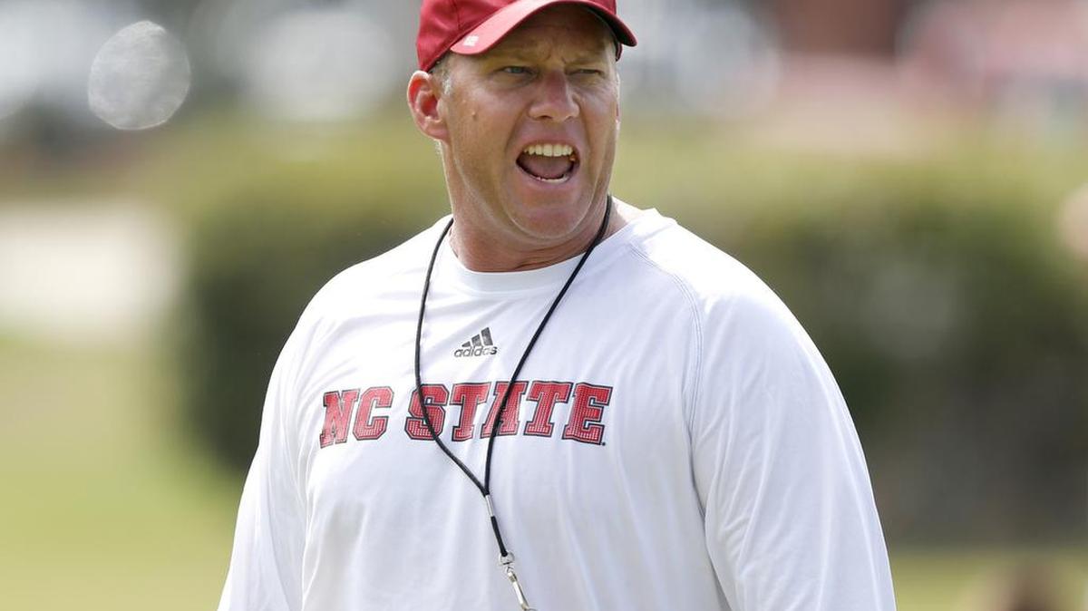 N.C. State head coach Dave Doeren yells during the Wolfpack's first practice of fall camp at the Dail Practice Complex in Raleigh, N.C., Monday, August 1, 2016.