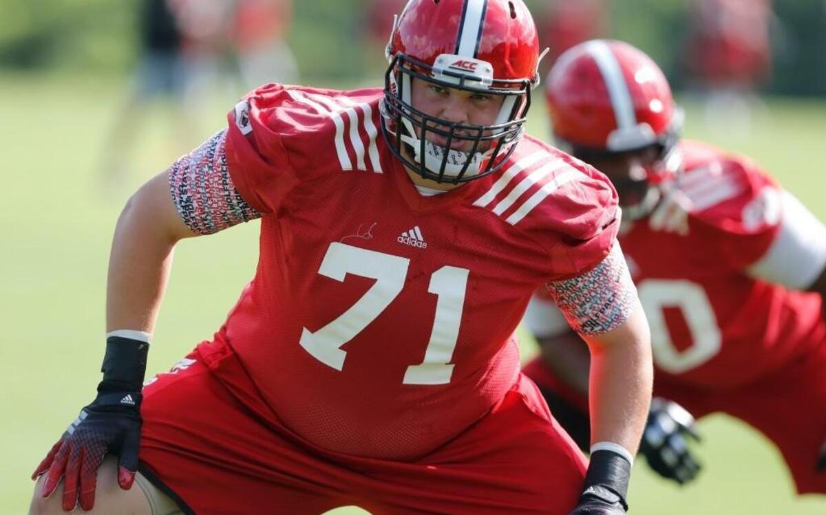
N.C. State's Alex Barr (71) warms up during the Wolfpack's first preseason practice Tuesday, August 4, 2015, in Raleigh.
