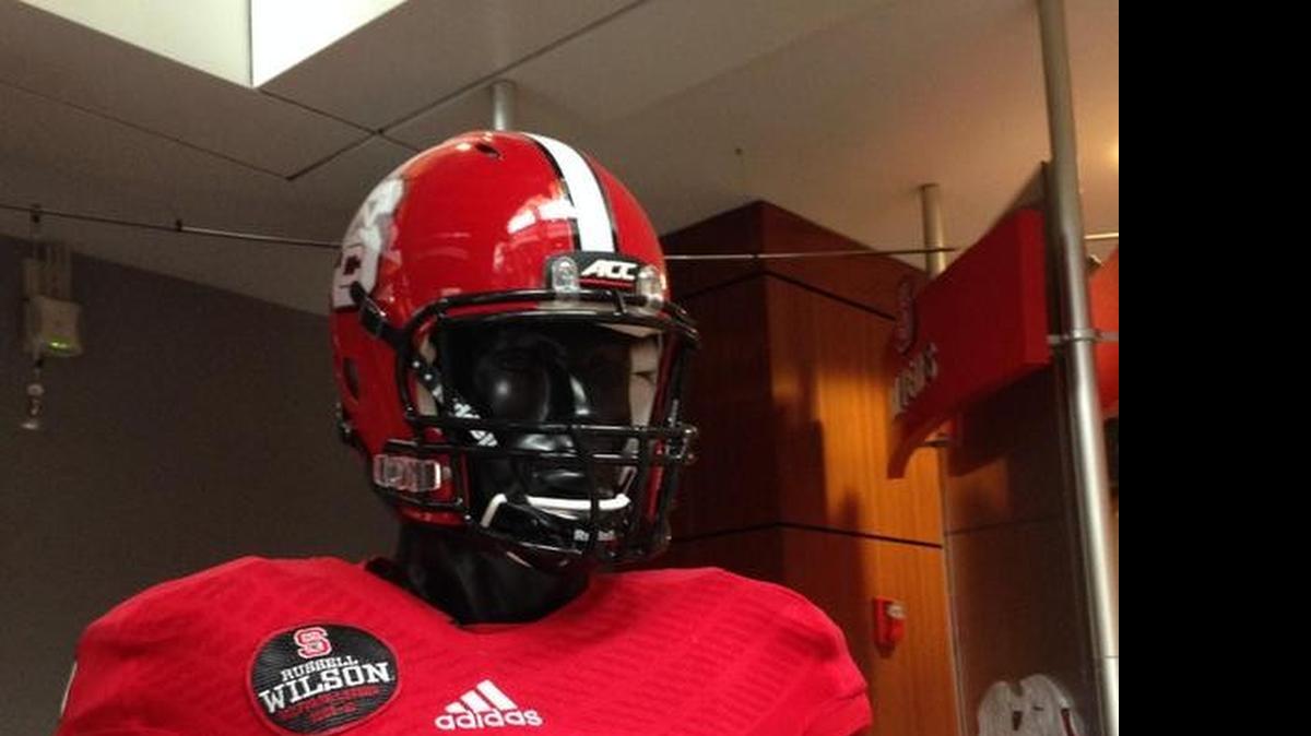 
A mannequin in a red N.C. State uniform and Russell Wilson's No. 16 jersey has been added to the lobby of the Murphy Center.

