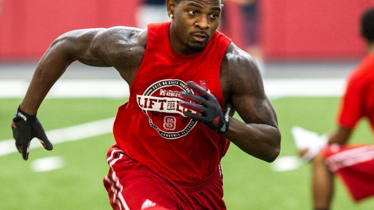 
N.C. State's Shadrach Thornton works out during a player-run workout and fundraising event to raise awareness and research dollars for leukemia Wednesday, July 22, 2015 at the Close-King Indoor Practice Facility.
