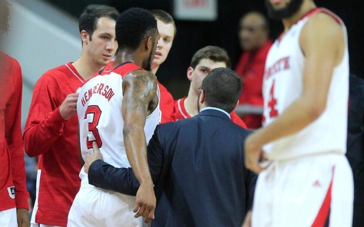 N.C. State Head Men's Basketball Athletic Trainer Ryan Holleman helps Terry Henderson (3) off the court during the first half of the Wolfpack's game against William & Mary at PNC Arena in Raleigh Friday, Nov. 13, 2015. Henderson did not return to the game.