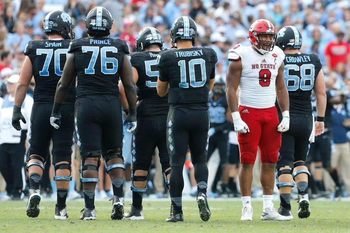 N.C. State defensive end Bradley Chubb (9) celebrates after stopping North Carolina on third down during N.C. State's 28-21 victory over UNC at Kenan Stadium on Nov. 25, 2016.